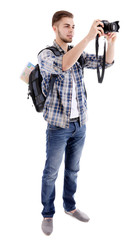 Traveler with camera isolated on white