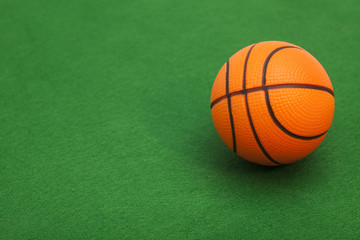 Basketball on green  background