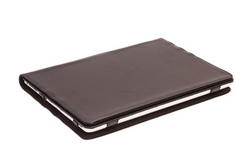 Tablet computer in cover isolated on white