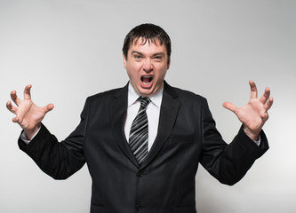 Angry businessman screaming