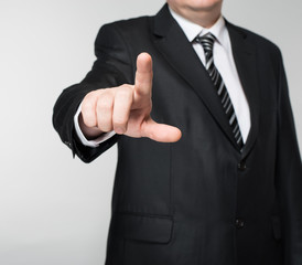 Businessman points finger