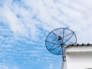 Satellite dish on roof top.