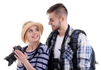 Pair of travelers with camera isolated on white