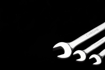 Three Fork Wrenches Isolated On Black Background