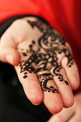 Image of henna on female hand, closeup