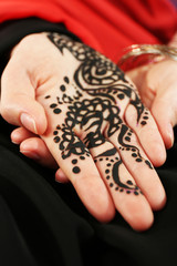 Image of henna on female hand, closeup