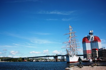Gothenburg waterfront and Lilla Bommen (House) under blue sky