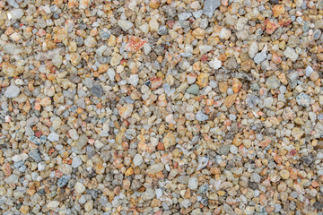 sand texture and stone pieces