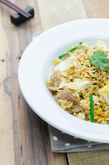 Fire instant noodle on white plate