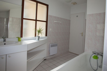 Nicely decorated modern white  washroom,