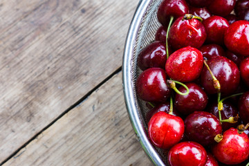 Fresh cherries on the wooden table