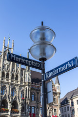 New city hall of Munich at Marienplatz with street sign in front