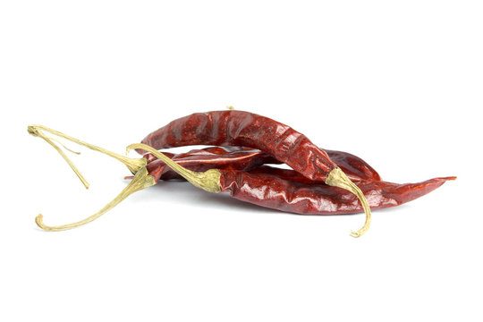 dried dark red dried chilli on white background, isolated