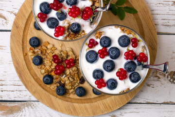 Yogurt, muesli and berries of blueberry and stone bramble