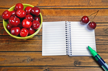 Naklejka na ściany i meble Empty notepad with cherries fruit