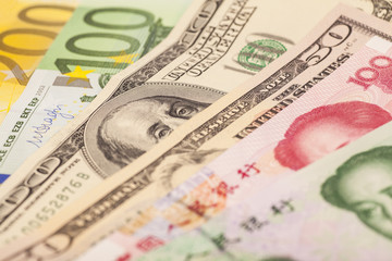 Chinese yuan, European euro notes and American dollars