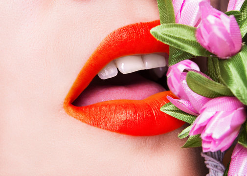 beautiful sexy lips saturated color with a bouquet of flowers
