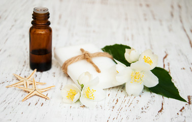 essential oil and soap with jasmine flower