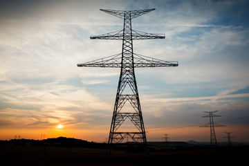 Newly built electricity pylon without wires at dusk