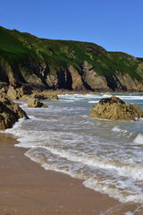 Fototapeta na wymiar Plemont beach, Jersey, U.K. Natural summer coastline.