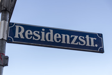 Street sign in front of the Residenz Theatre in Munich, Germany,