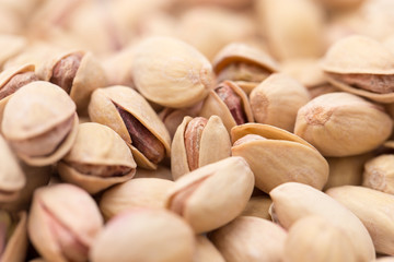 pistachios as a background. close