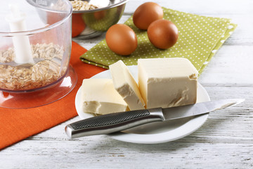 Ingredients for oatmeal cookies on wooden table, closeup