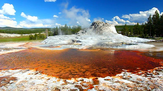 Hot spring below Castle Geyser at Yellowstone National Park