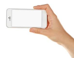 Hand holding mobile smart phone isolated on white