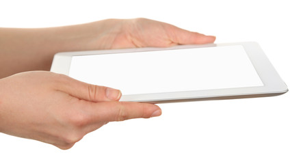 Hands holding tablet isolated on white