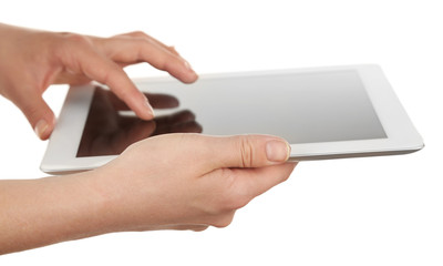Hands holding tablet isolated on white