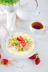 Healthy breakfast with homemade oatmeal, close up
