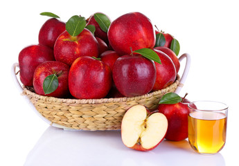 Ripe red apple in wicker basket isolated on white