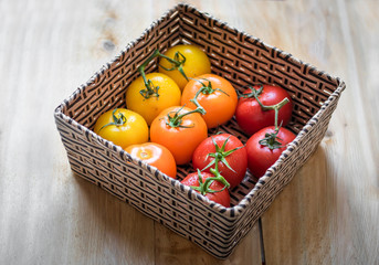 Basket with ten tomatoes