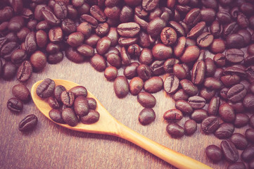 Coffee beans and wooden spoon with filter effect retro vintage s