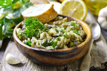 Eggplant salad with olive oil,herb and garlic. © lilechka75