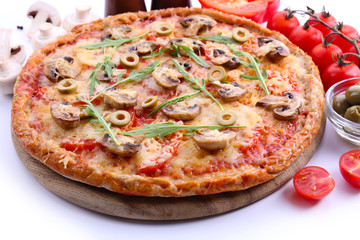 Tasty pizza with vegetables and arugula close up