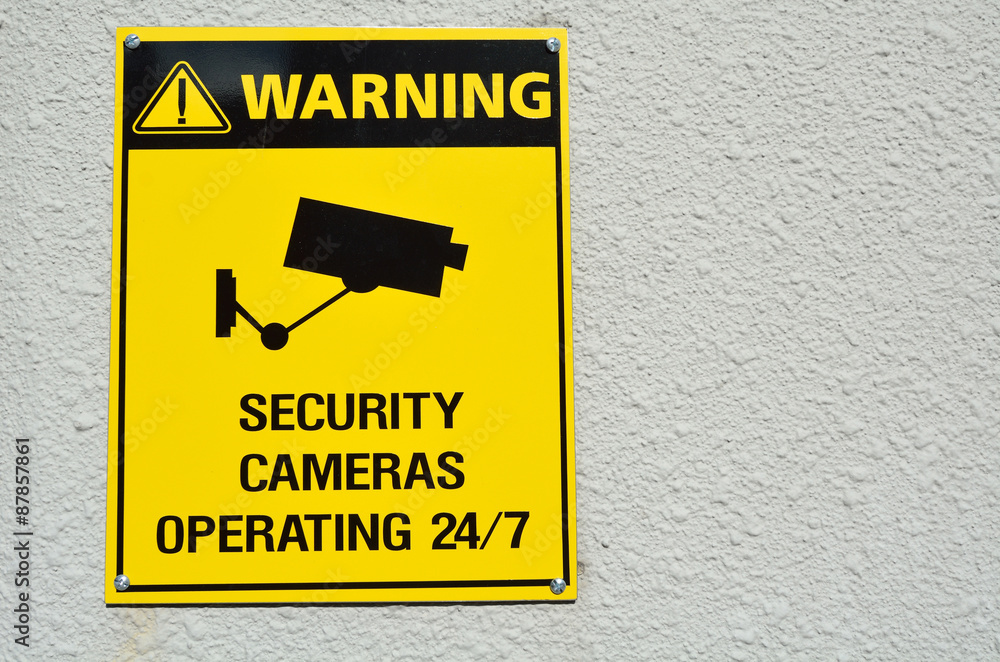 Wall mural Yellow warning cctv security cameras sign