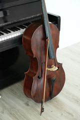 Cello near piano, indoors