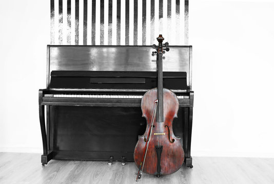 Cello near piano, indoors