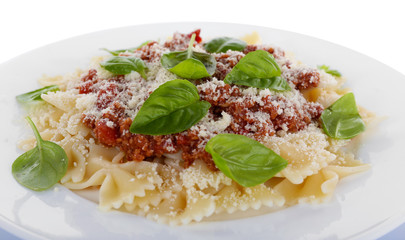 Pasta bolognese on white plate isolated on white