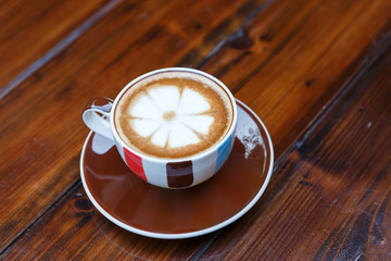 Coffee cup on table in cafe