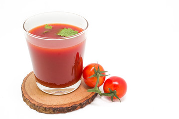 Fresh tomato juice isolated on white background