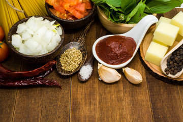 Raw spaghetti Ingredients on wooden table
