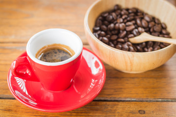 Fresh brewed hot espresso with roasted bean