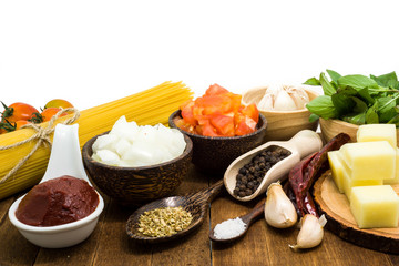 Raw spaghetti Ingredients on wooden table