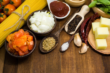Raw spaghetti Ingredients on wooden table