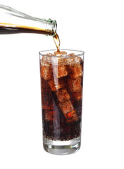Bottle pouring cola soda drink in glass with ice cubes