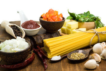 Raw spaghetti Ingredients on wooden table