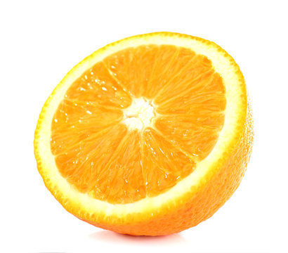 Half orange fruit isolated on white
